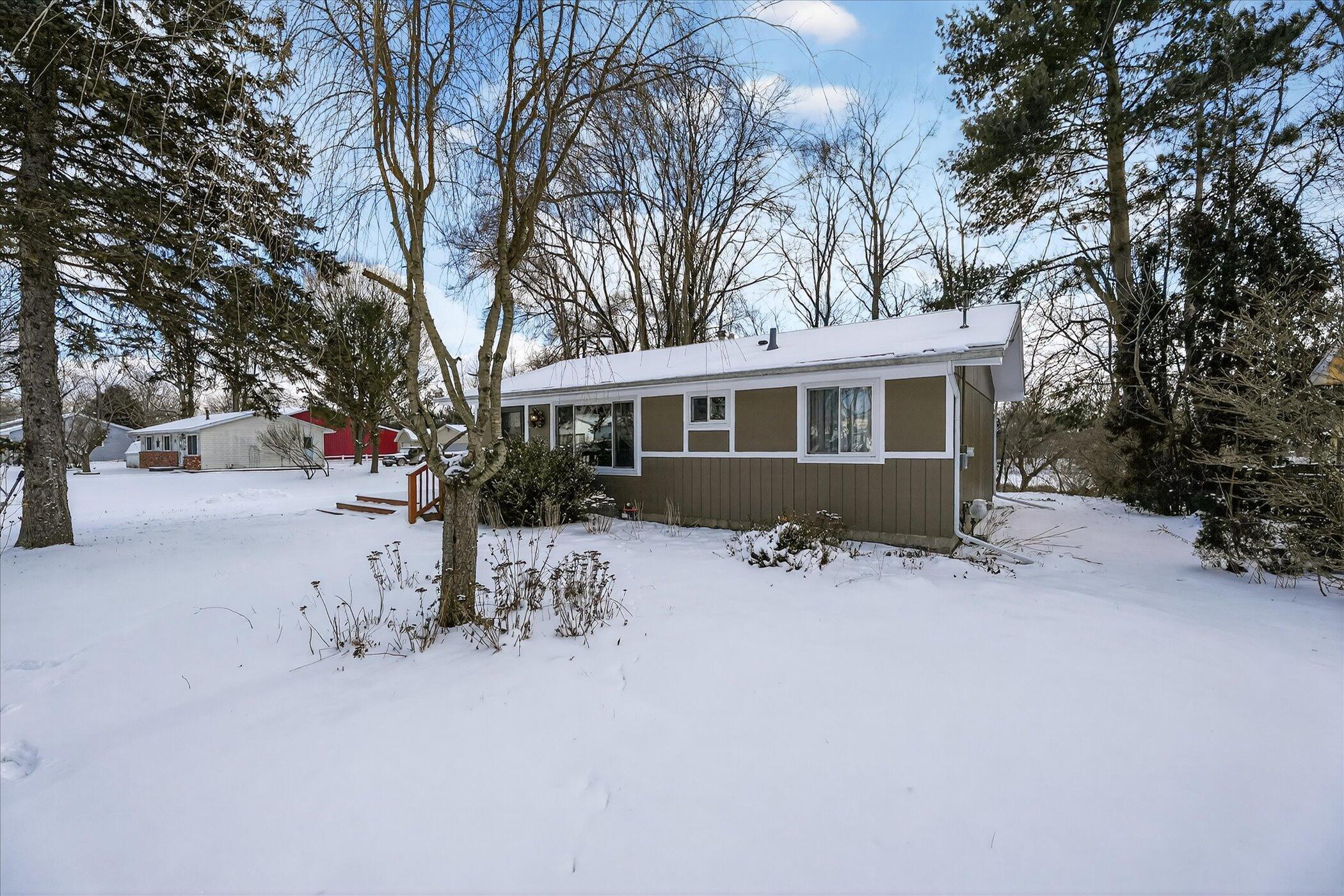 217 Portage Street Pinckney, MI 48169 - Photo 4 of 35 04-217-Portage-St-Pinckney-MI-48169-Wind