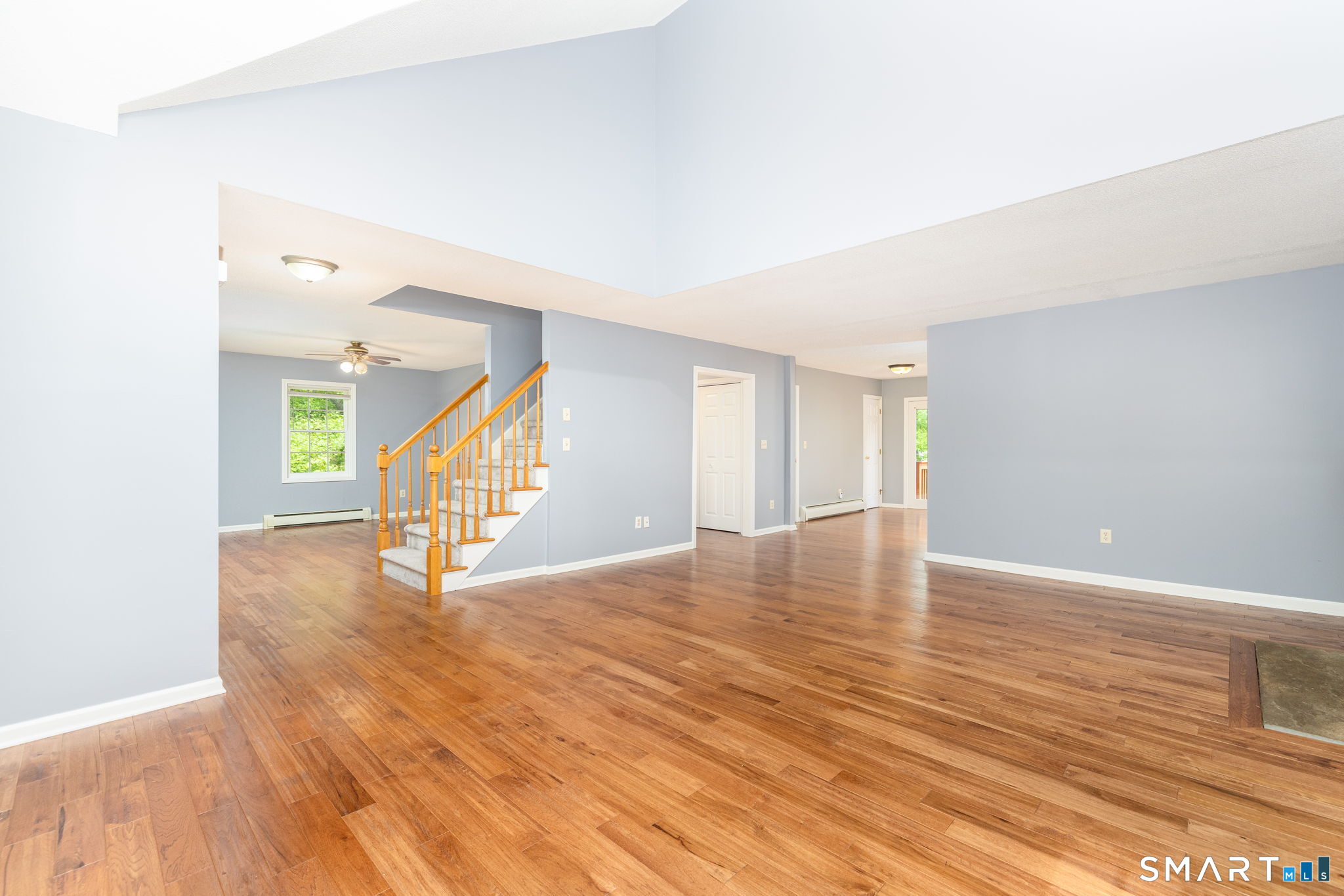 175 Vernon Street Manchester, CT 06042 - Photo 9 of 38 a view of an empty room with wooden floor