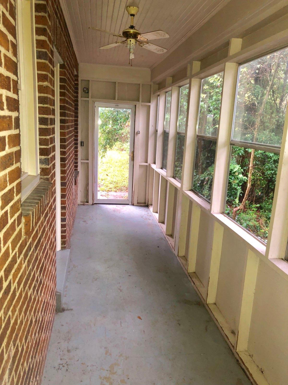 306 Robinson Street Rockingham, NC 28379 - Photo 4 of 11 306 Robinson enclosed porch-sunroom