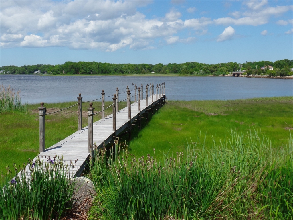 17 River Road Marion, MA 02738 - Photo 3 of 36 a view of lake with houses in background