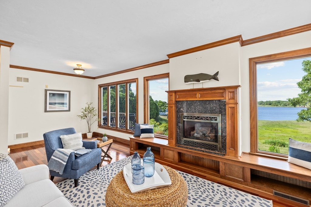 17 River Road Marion, MA 02738 - Photo 10 of 36 a living room with furniture and a fireplace