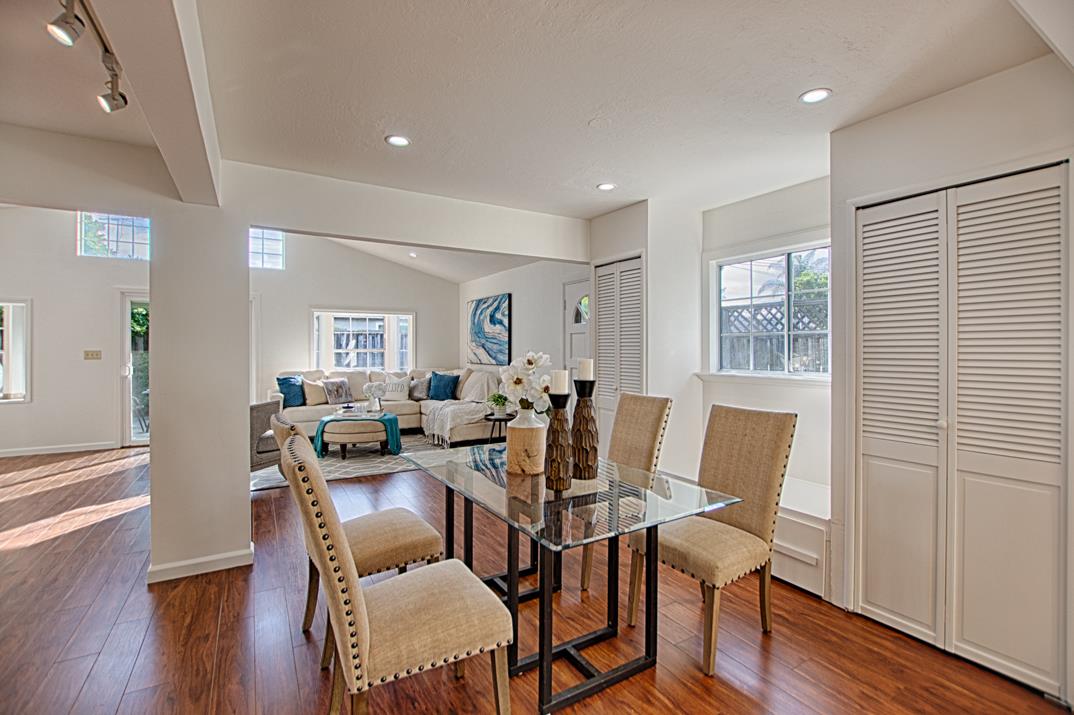 1663 Spring Street Mountain View, CA 94043 - Photo 11 of 31 a view of a dining room with furniture window and wooden floor
