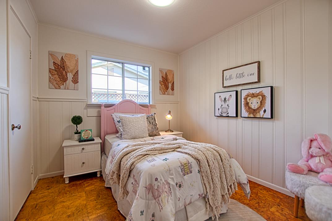 1663 Spring Street Mountain View, CA 94043 - Photo 19 of 31 a bedroom with a bed and a window