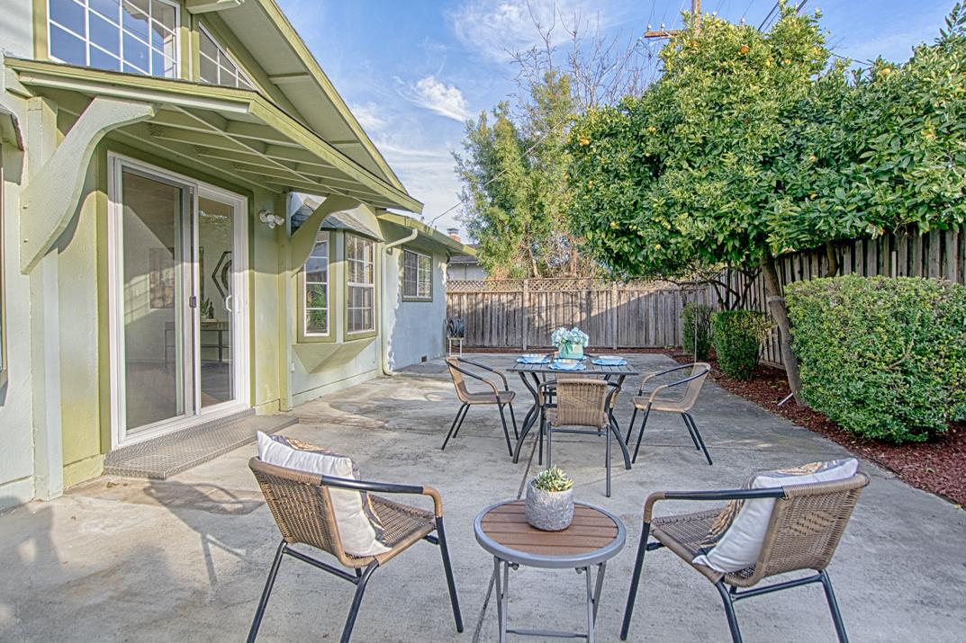 1663 Spring Street Mountain View, CA 94043 - Photo 24 of 31 a view of a patio with table and chairs and potted plants