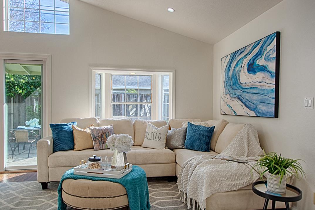 1663 Spring Street Mountain View, CA 94043 - Photo 7 of 31 a living room with furniture and a large window