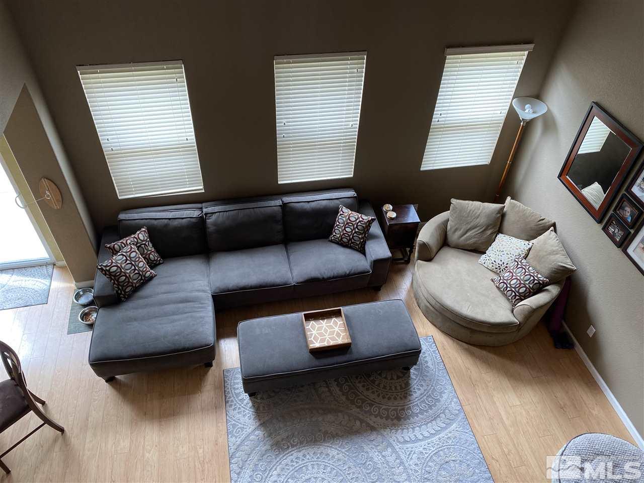8921 Sorcha Street Reno, NV 89506 - Photo 35 of 35 a living room with furniture and a flat screen tv