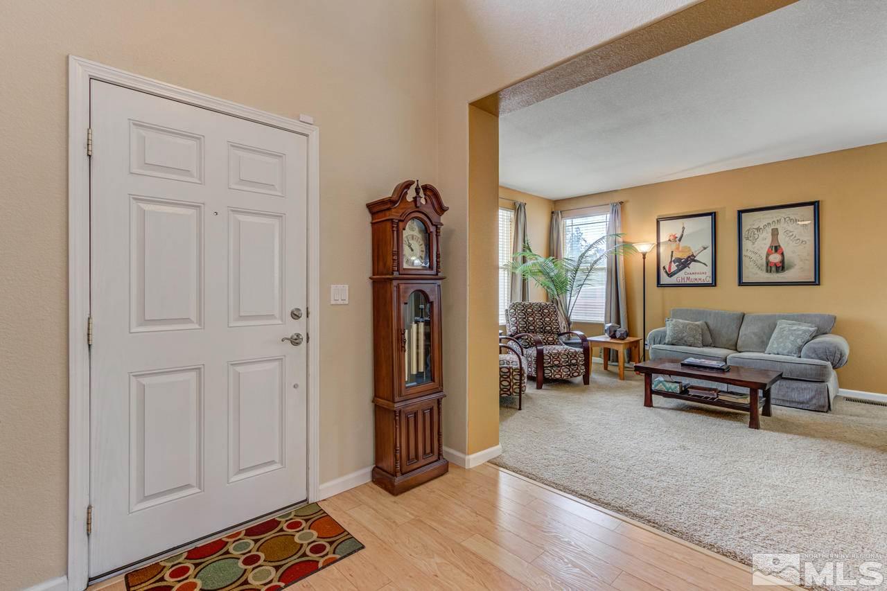 8921 Sorcha Street Reno, NV 89506 - Photo 4 of 35 a living room with furniture and a window