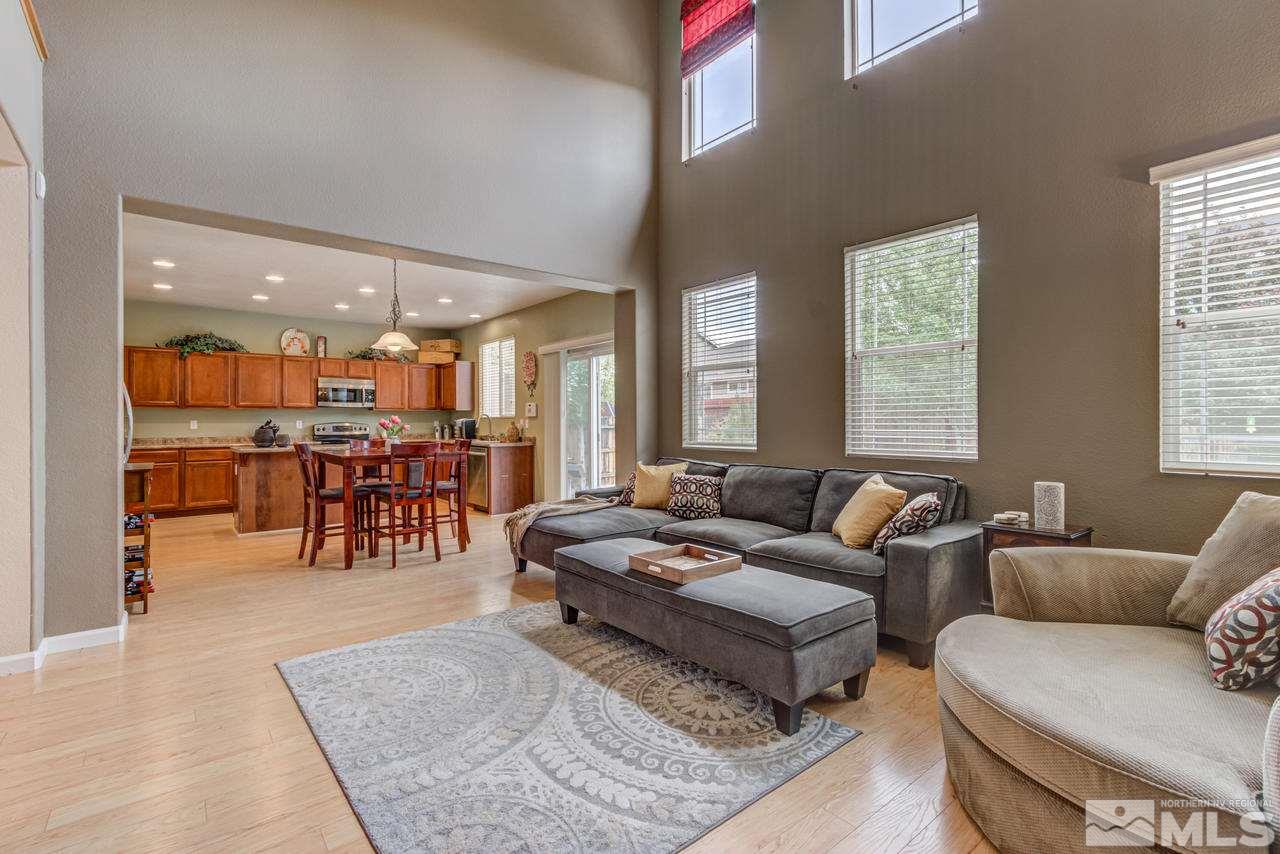 8921 Sorcha Street Reno, NV 89506 - Photo 7 of 35 a living room with furniture and a large window