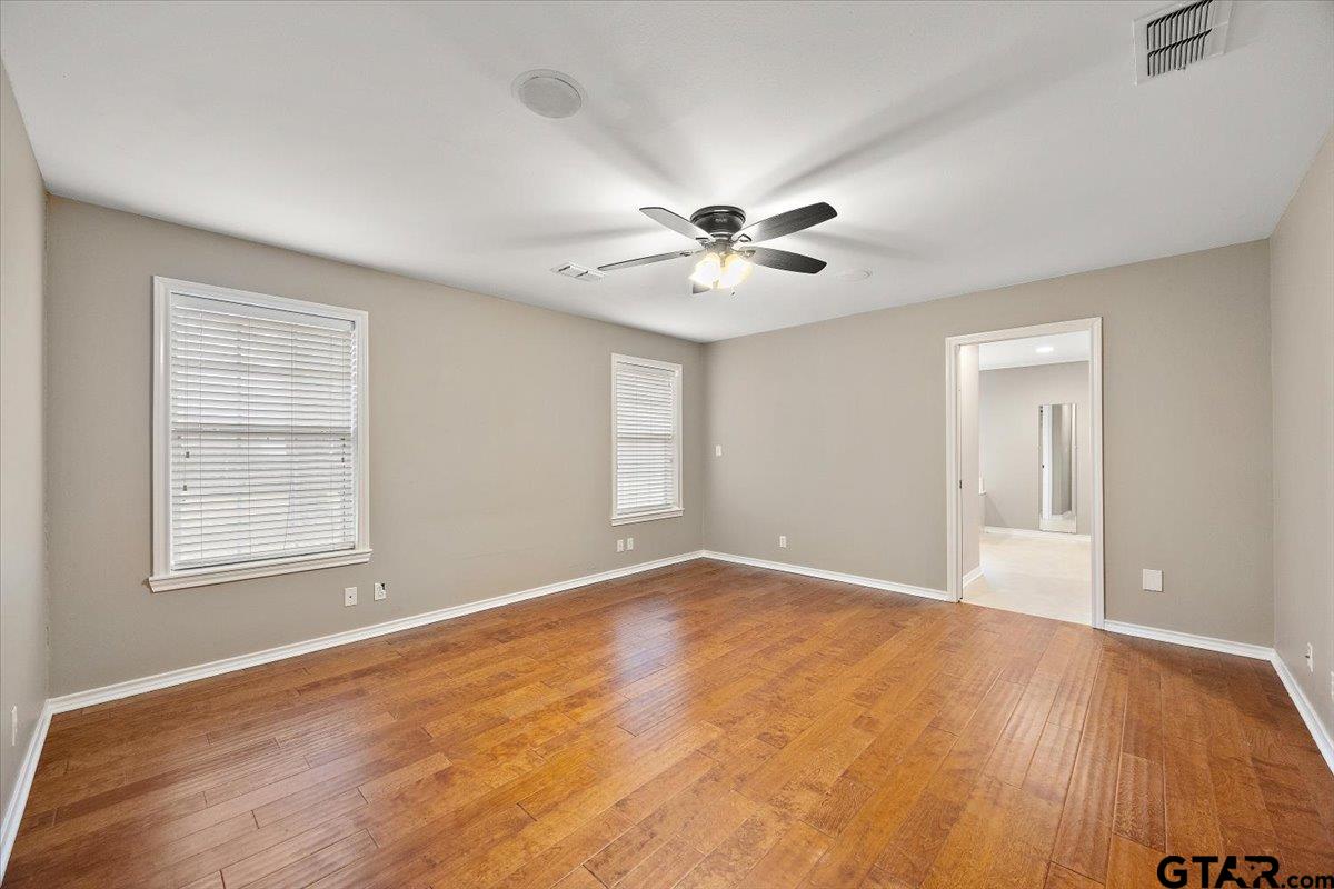 142 Parrish Rusk, TX 75785 - Photo 13 of 43 wooden floor in an empty room with a window
