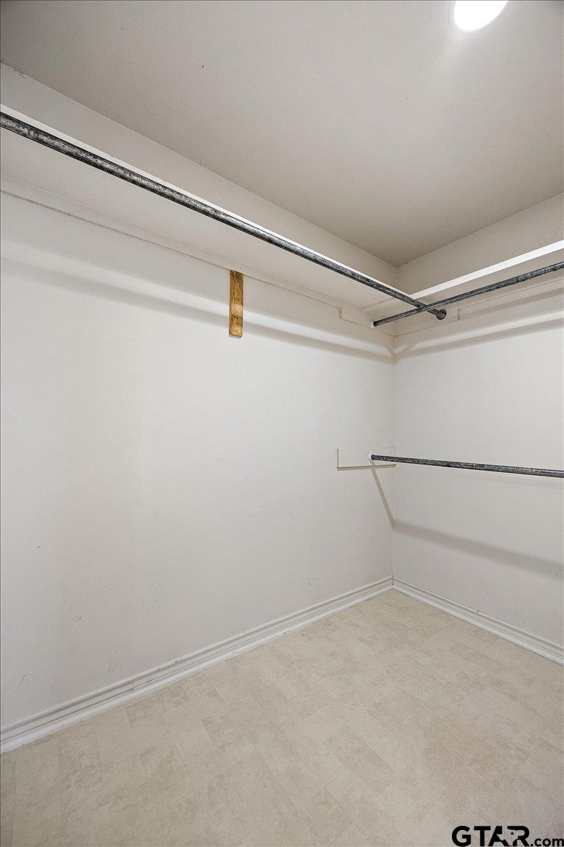 142 Parrish Rusk, TX 75785 - Photo 17 of 43 a view of an empty walk in closet