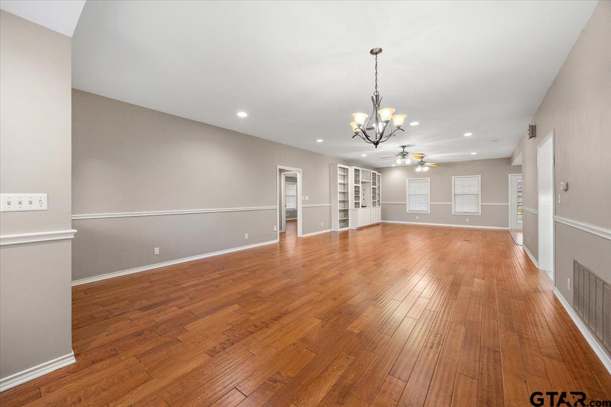 142 Parrish Rusk, TX 75785 - Photo 5 of 43 a view of a room with wooden floor and chandelier