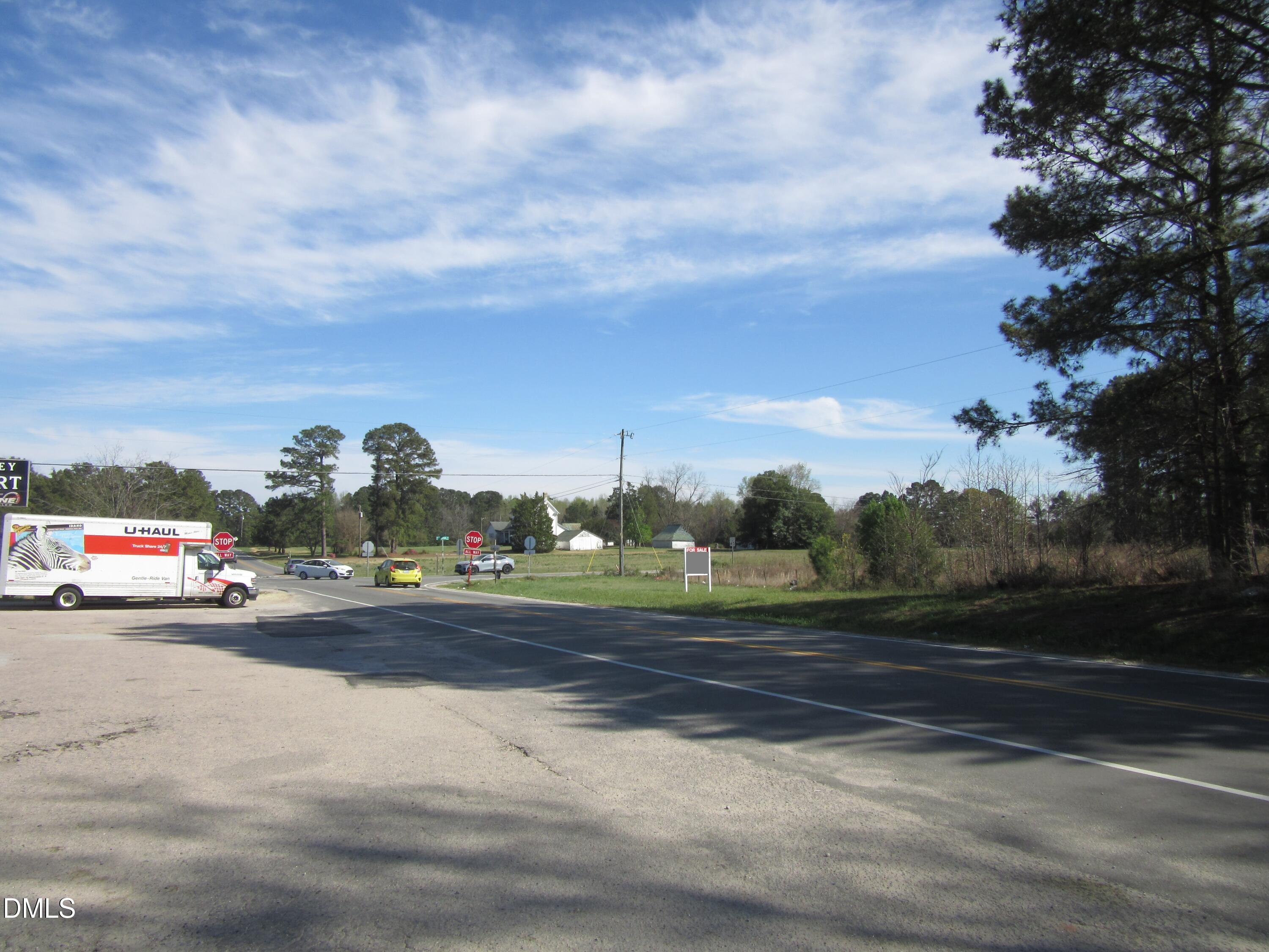 8.78-acres Riley Hill Road Wendell, NC 27591 - Photo 12 of 13 a view of street with cars