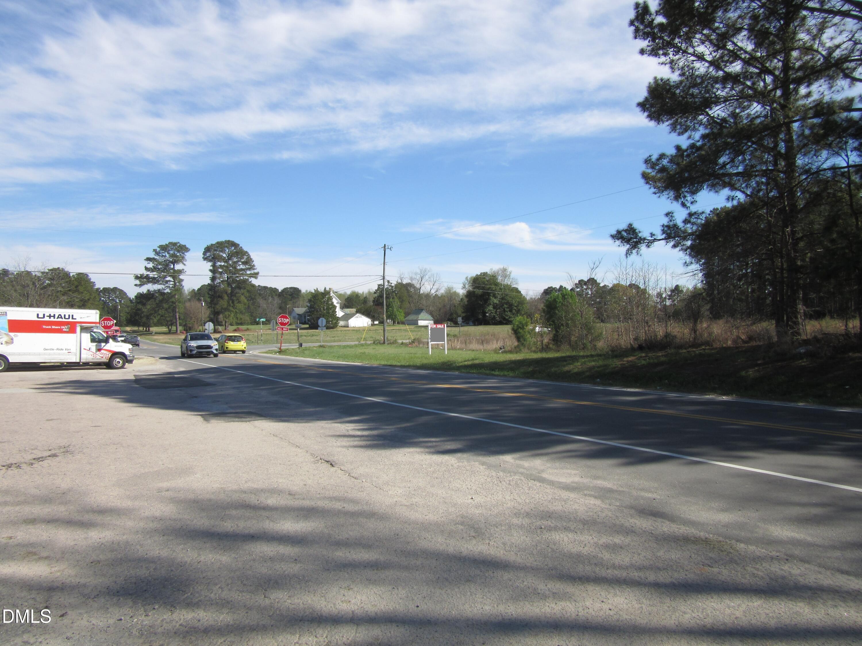 8.78-acres Riley Hill Road Wendell, NC 27591 - Photo 13 of 13 a view of street with cars