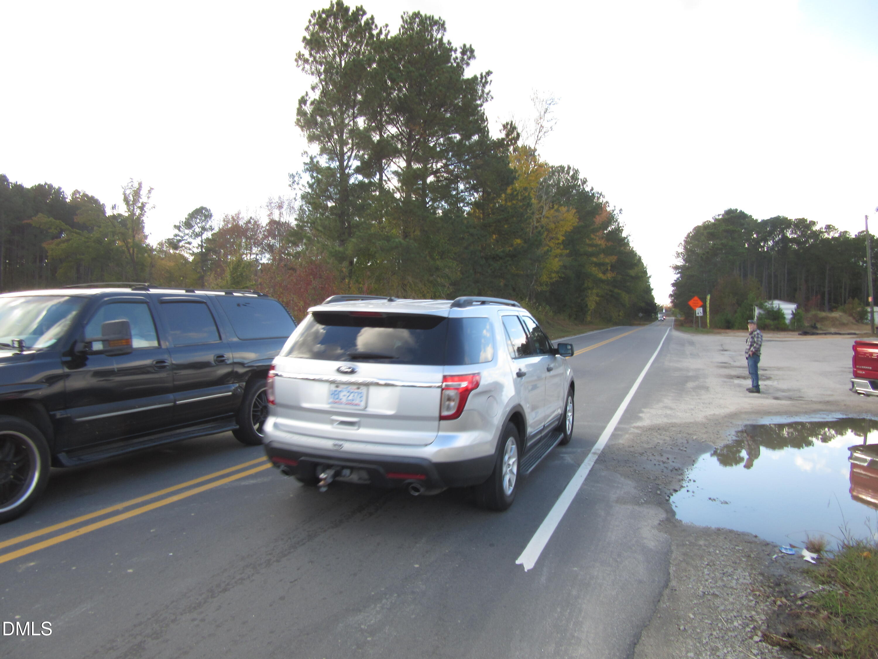 8.78-acres Riley Hill Road Wendell, NC 27591 - Photo 2 of 7 a front view of a house with a garden