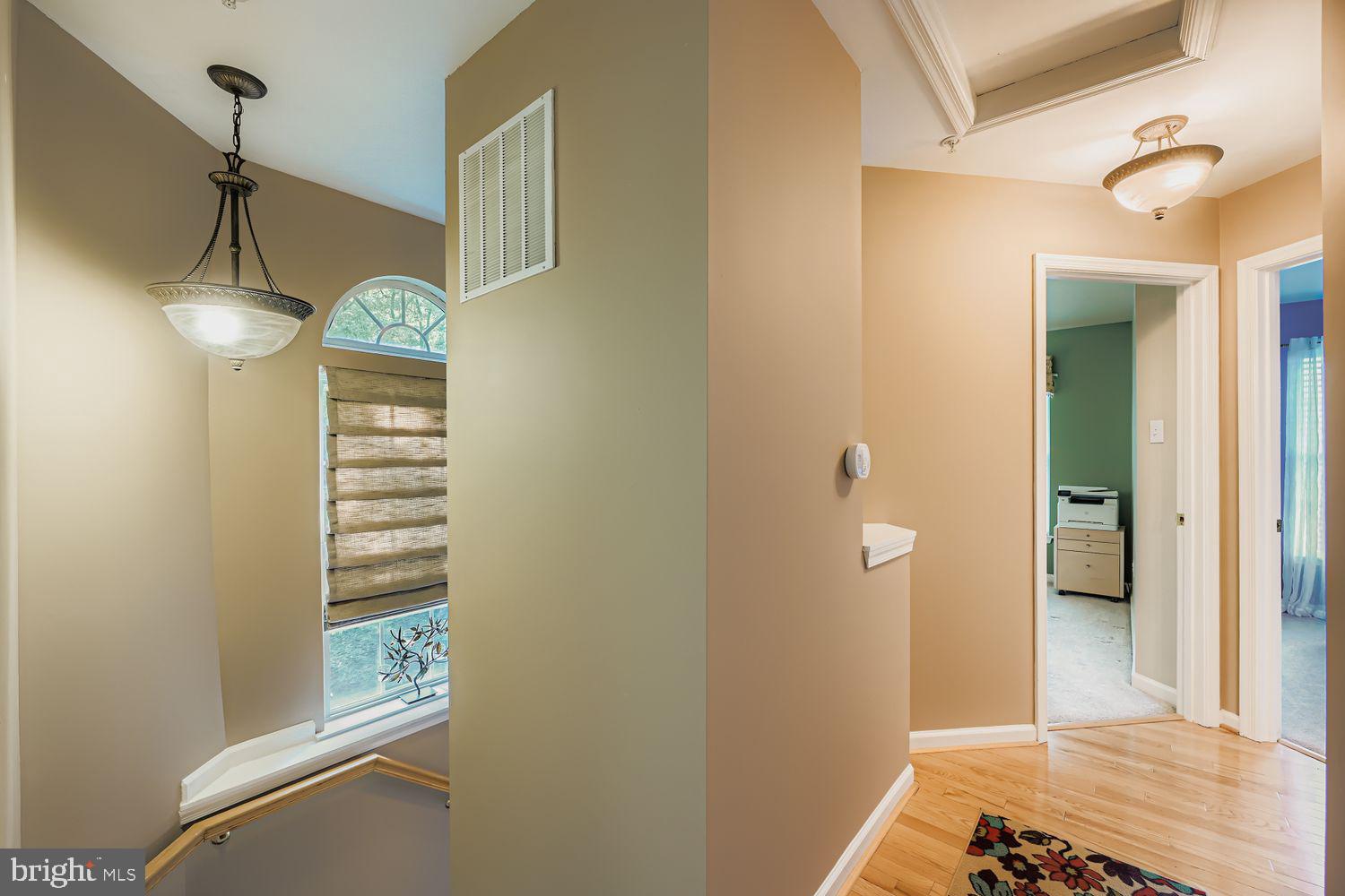 9809 Redwing Drive, Unit 9809 Perry Hall, MD 21128 - Photo 24 of 42 a bathroom with a sink and a mirror