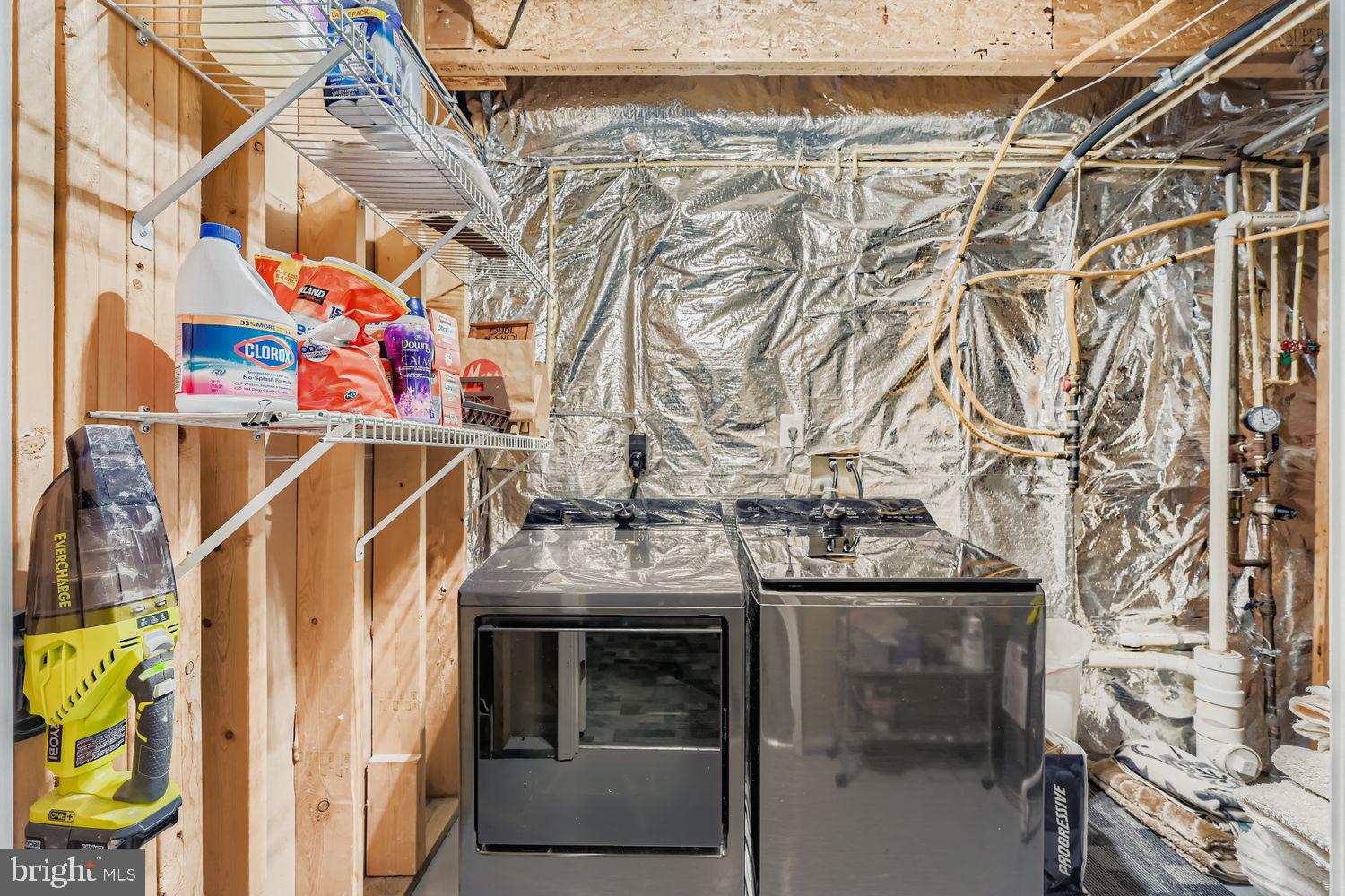 9809 Redwing Drive, Unit 9809 Perry Hall, MD 21128 - Photo 30 of 42 a utility room with multiple dryer and washer