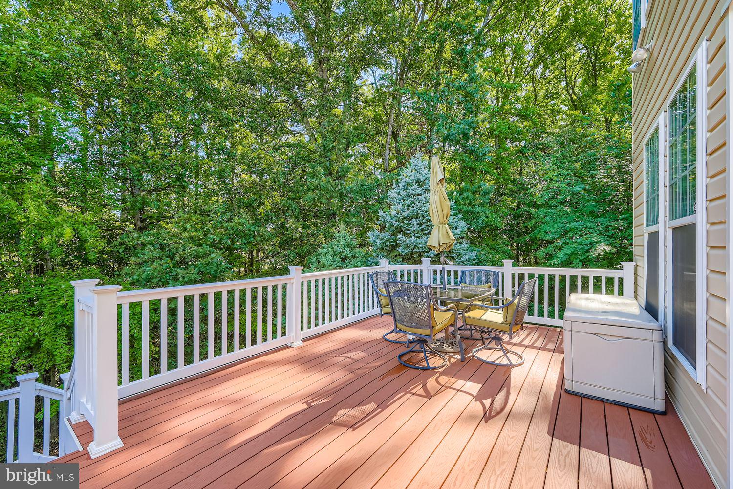 9809 Redwing Drive, Unit 9809 Perry Hall, MD 21128 - Photo 33 of 42 a view of balcony with furniture and wooden floor