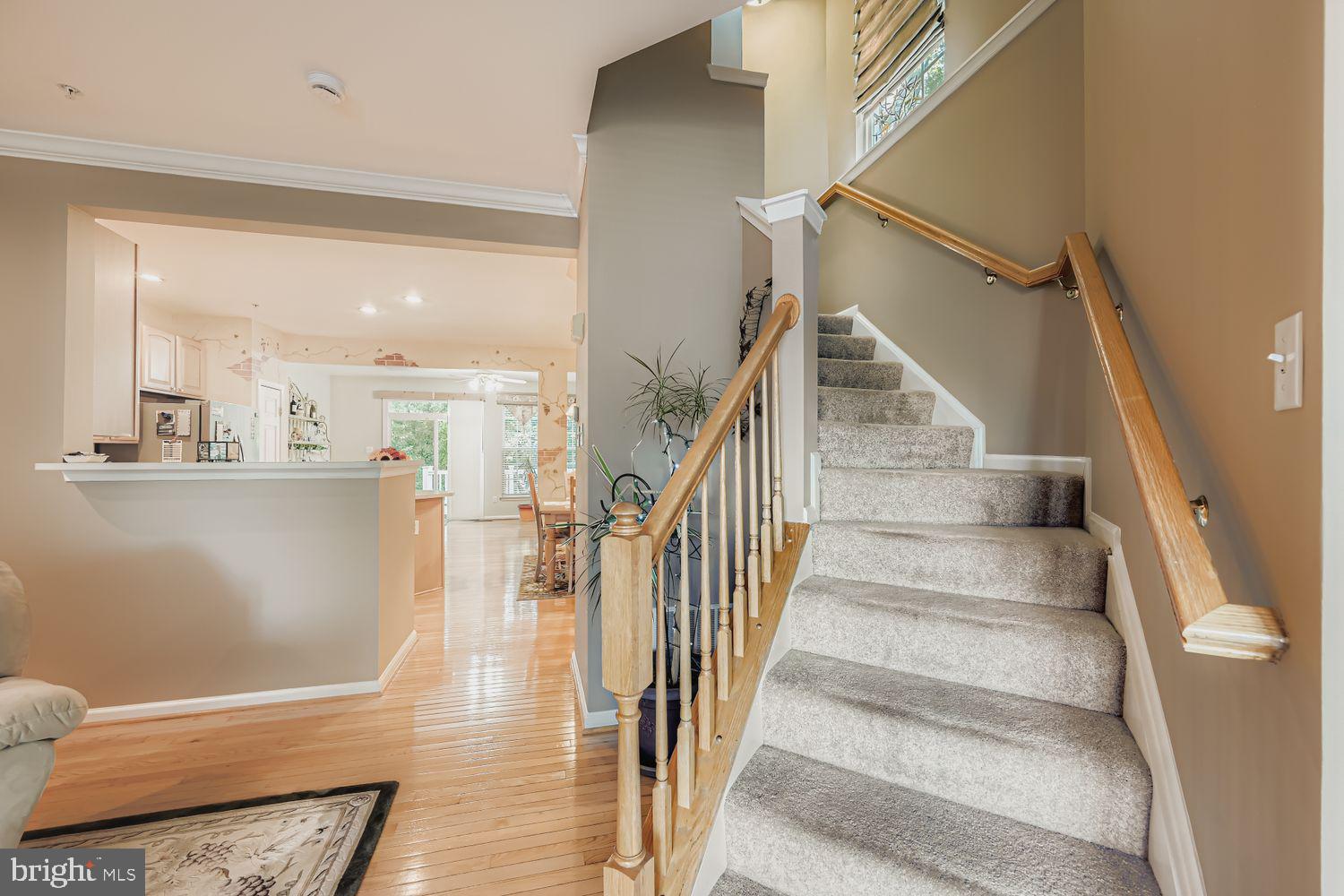 9809 Redwing Drive, Unit 9809 Perry Hall, MD 21128 - Photo 6 of 42 a view of entryway and hall with wooden floor