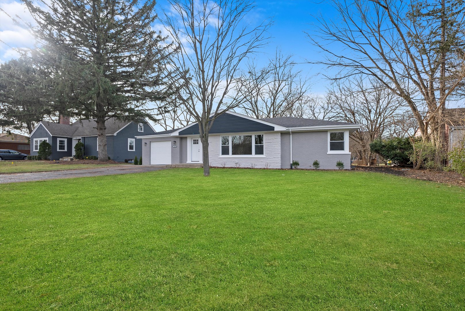 5426 Wolf Road Western Springs, IL 60558 - Photo 16 of 19 a front view of house with yard and green space