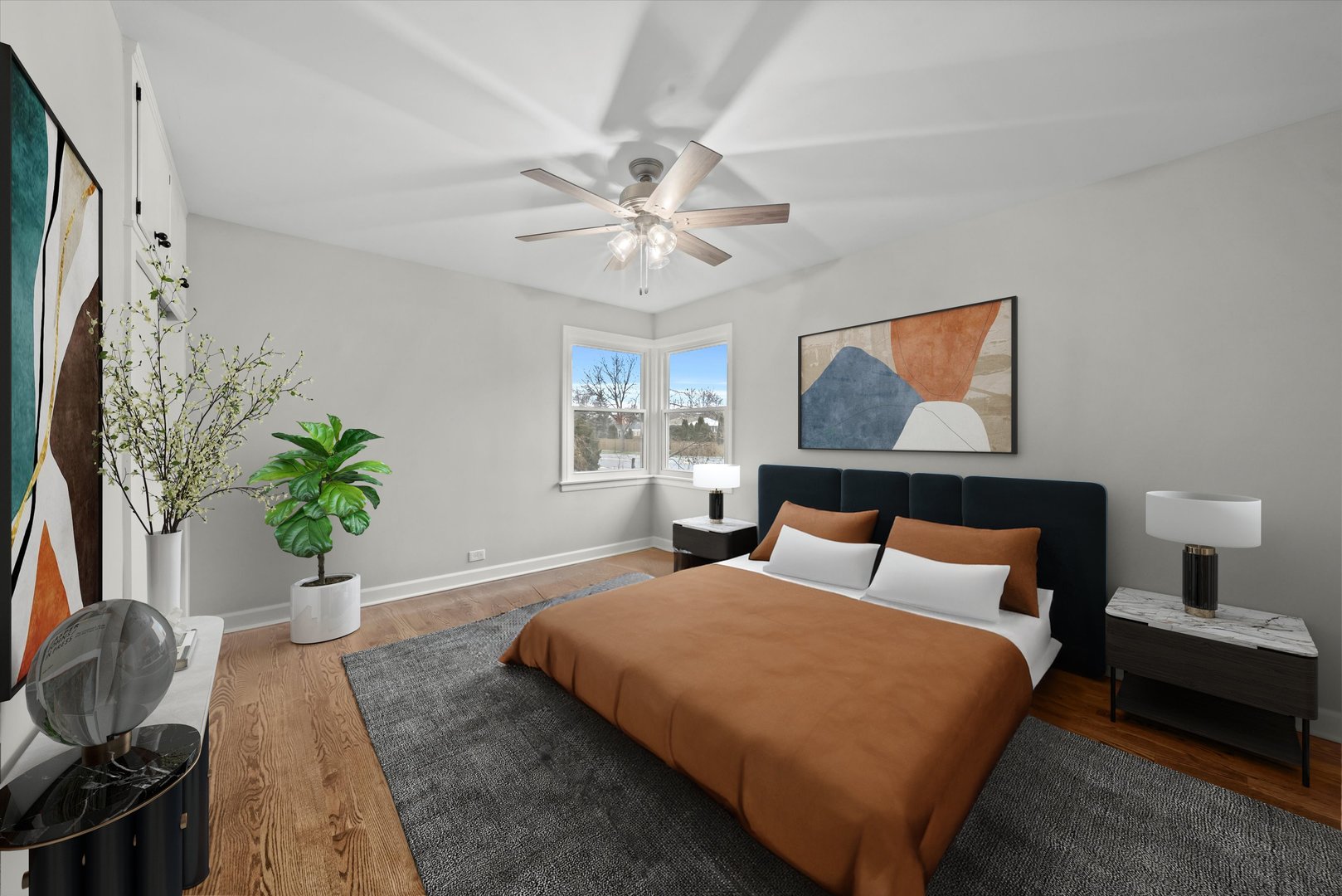 5426 Wolf Road Western Springs, IL 60558 - Photo 8 of 19 a bedroom with a bed and a chandelier