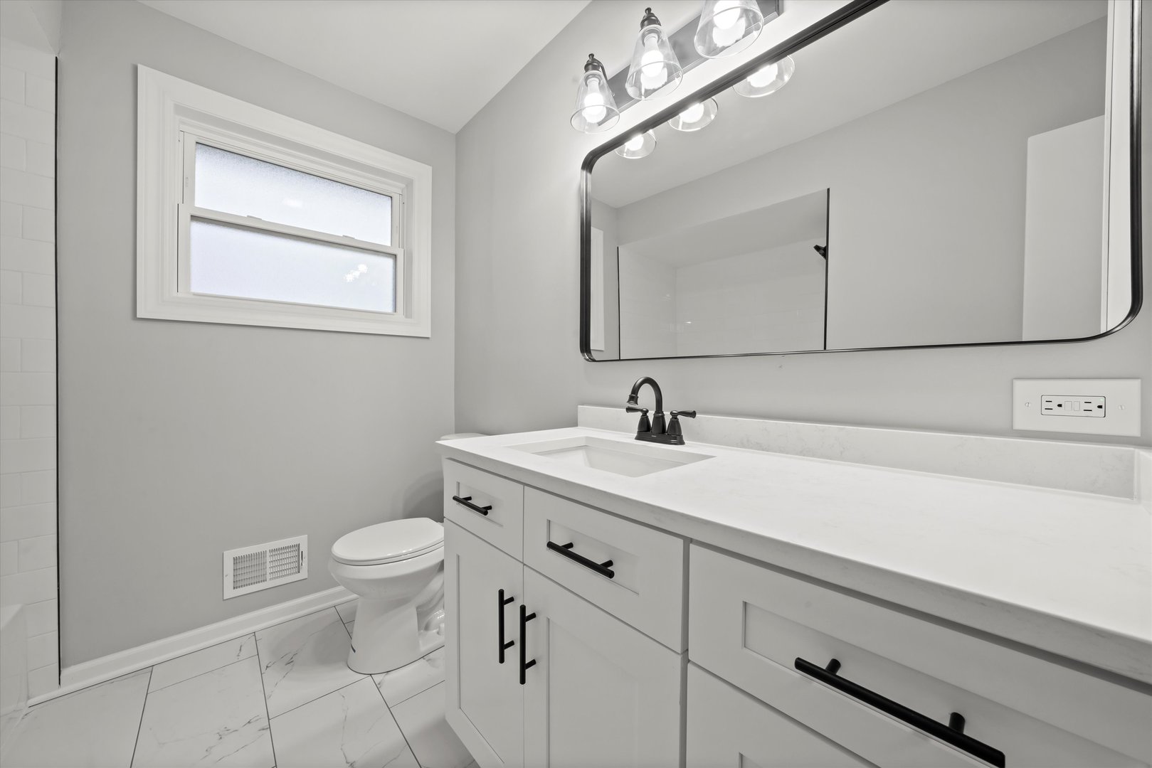 5426 Wolf Road Western Springs, IL 60558 - Photo 10 of 19 a view of bathroom with a sink and mirror