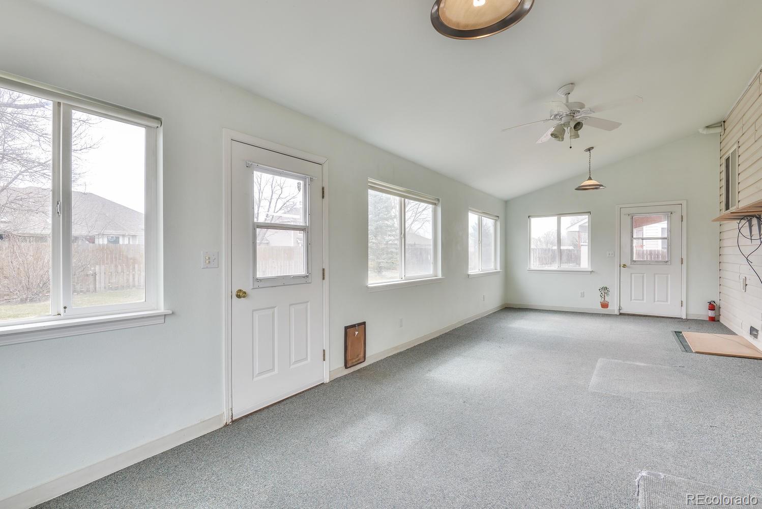 1437 Walnut Street Windsor, CO 80550 - Photo 13 of 35 a view of an empty room with a window
