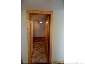 171 Z (aka Barking Dog Rd) Road Silverthorne, CO 80498 - Photo 16 of 25 a view of a bathroom from a hallway