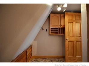 171 Z (aka Barking Dog Rd) Road Silverthorne, CO 80498 - Photo 17 of 25 a view of a livingroom with washer and dryer