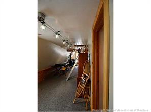 171 Z (aka Barking Dog Rd) Road Silverthorne, CO 80498 - Photo 9 of 25 a view of a hallway with couches and a room