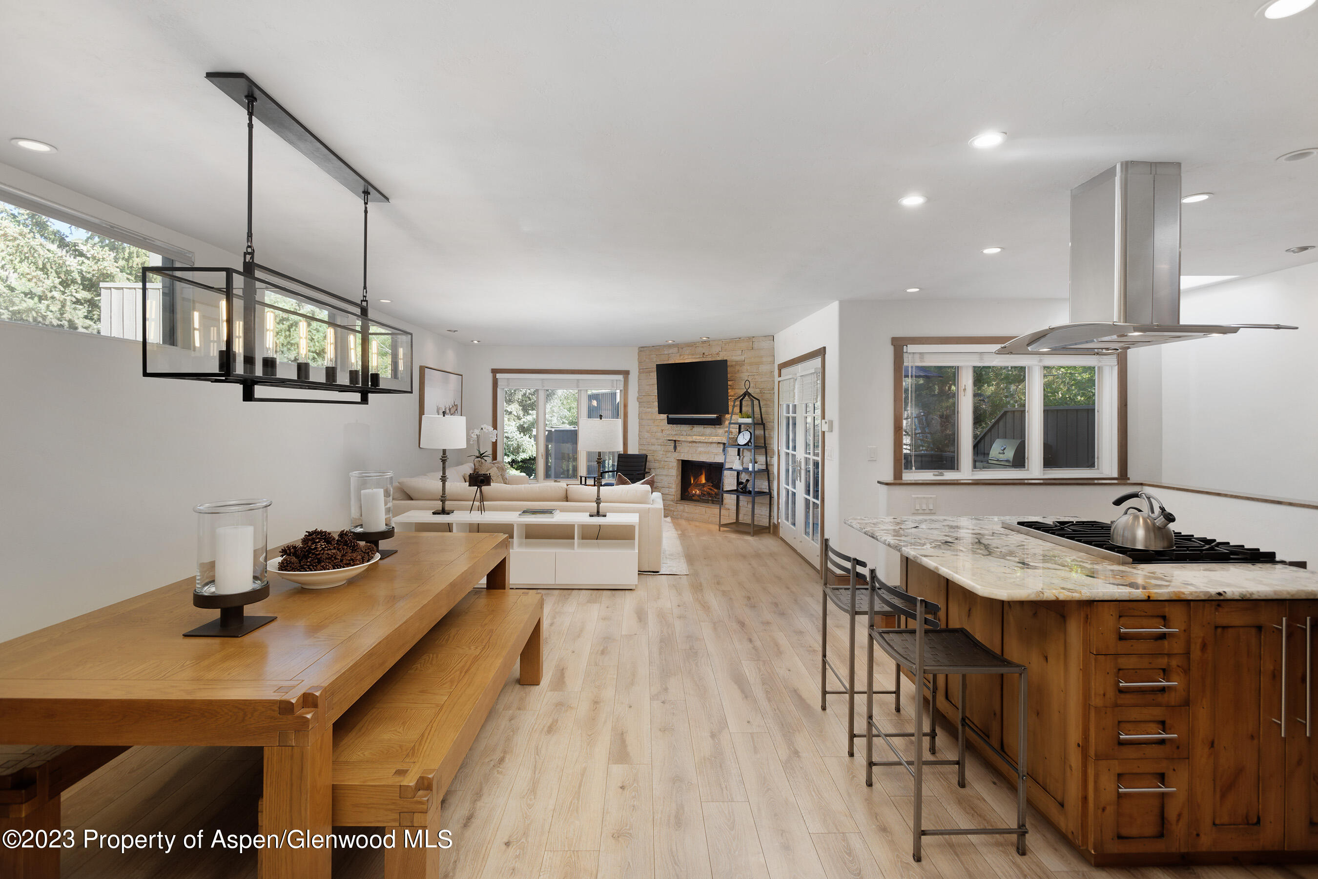 232 Meadow Ranch Road Snowmass Village, CO 81615 - Photo 18 of 18 a living room with stainless steel appliances kitchen island granite countertop furniture