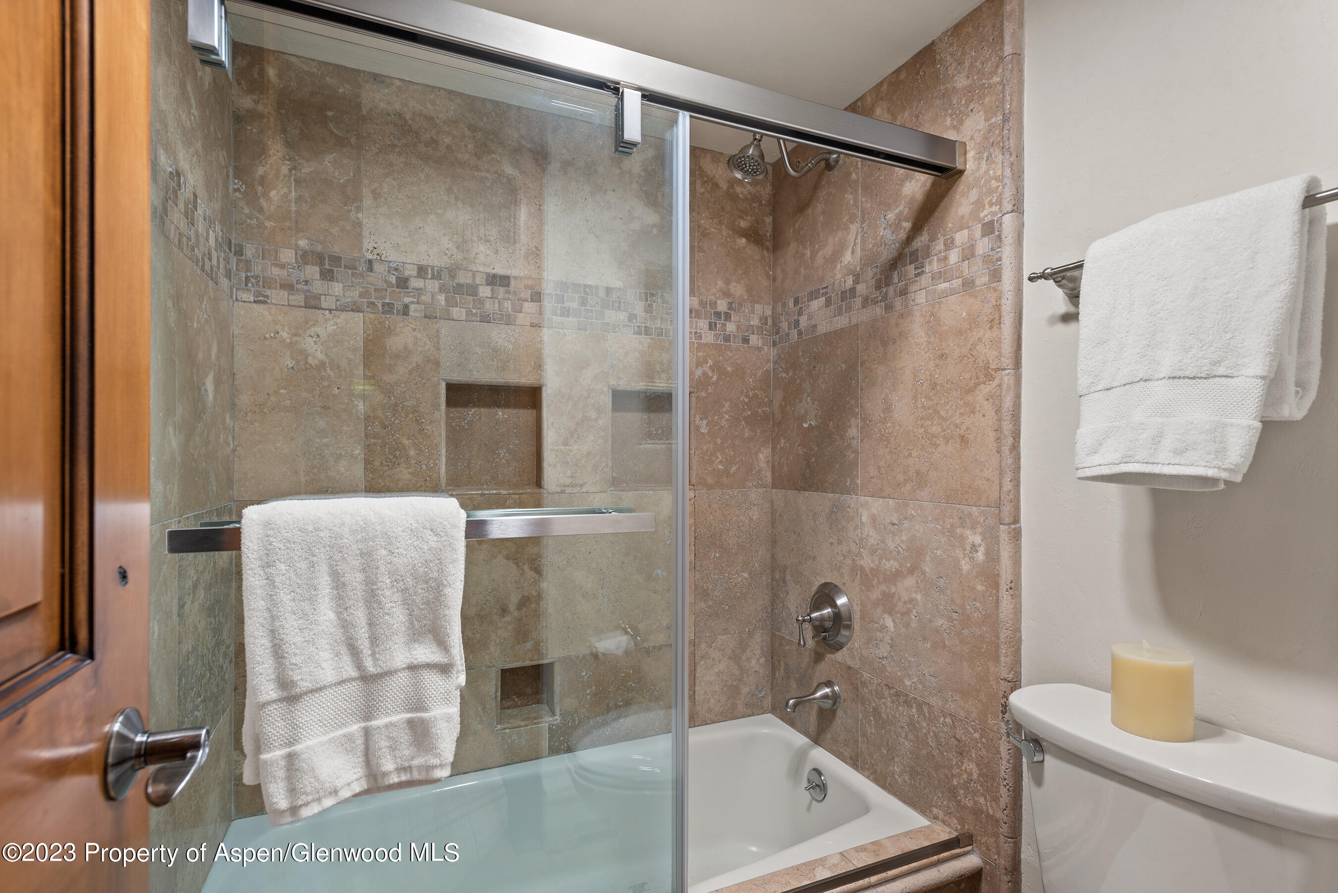 232 Meadow Ranch Road Snowmass Village, CO 81615 - Photo 15 of 18 a bathroom with a tub and shower