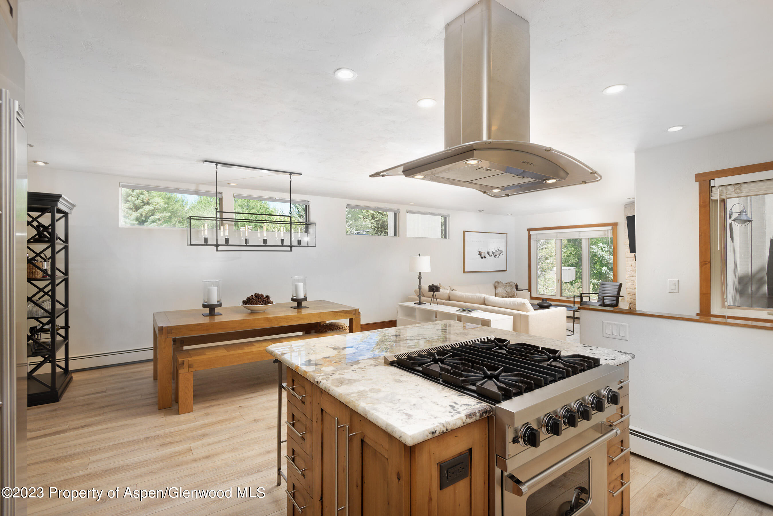 232 Meadow Ranch Road Snowmass Village, CO 81615 - Photo 6 of 18 a kitchen with a stove and a sink