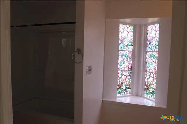 a bathroom with a window