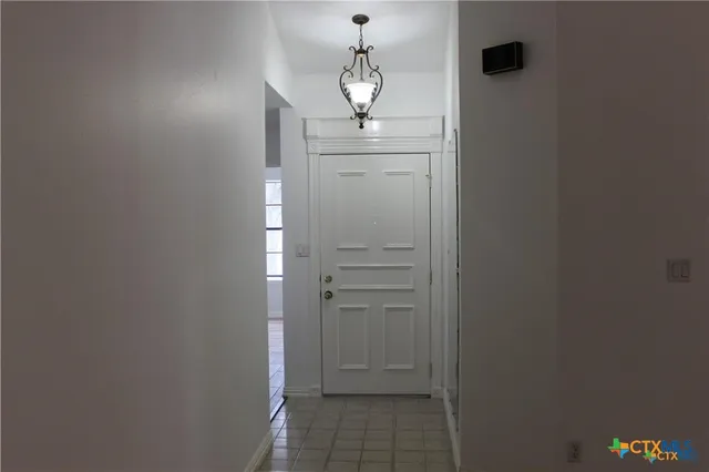 a view of a hallway with closet