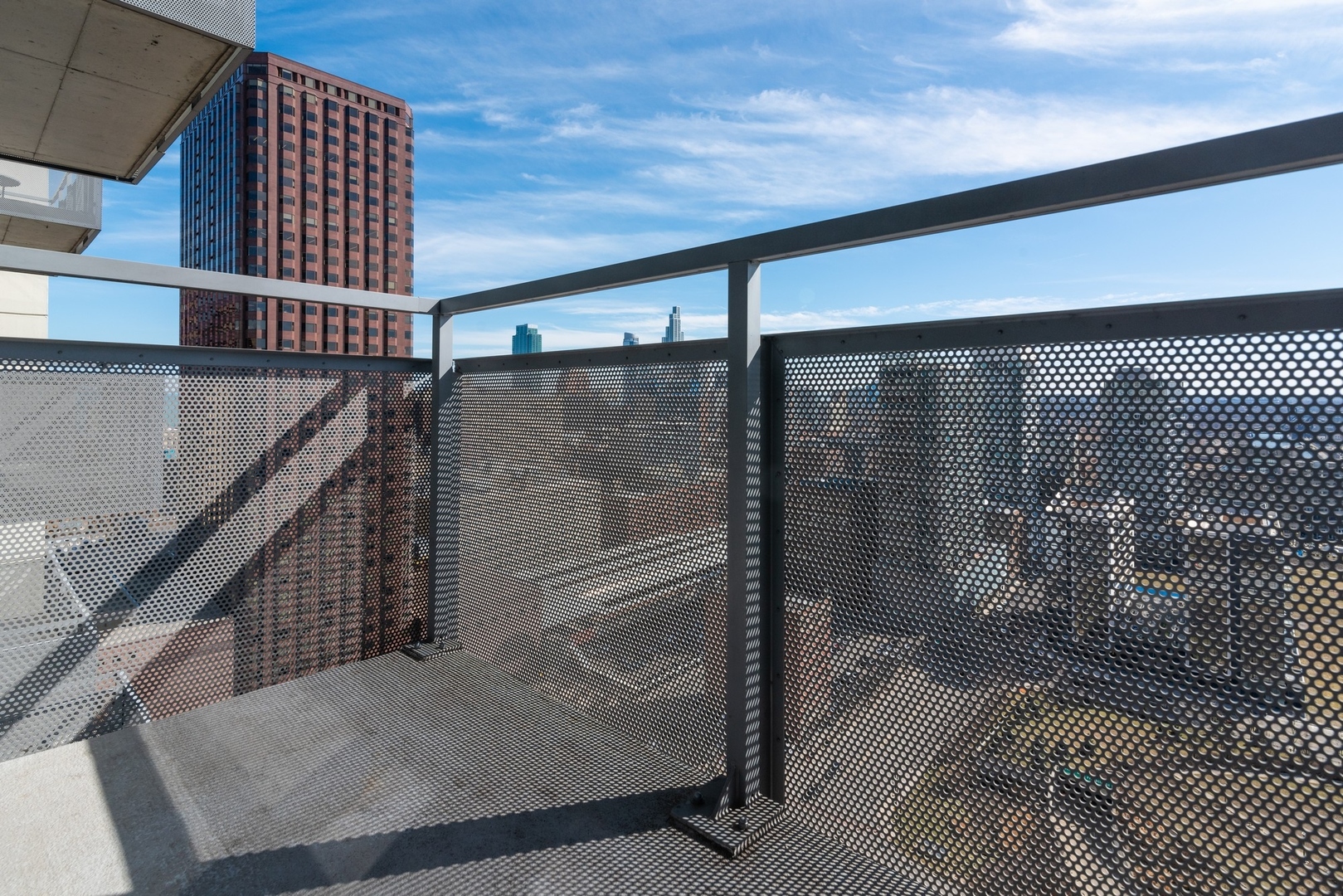 235 West Van Buren Street, Unit 2905 Chicago, IL 60607 - Photo 14 of 18 a view of balcony with wooden floor