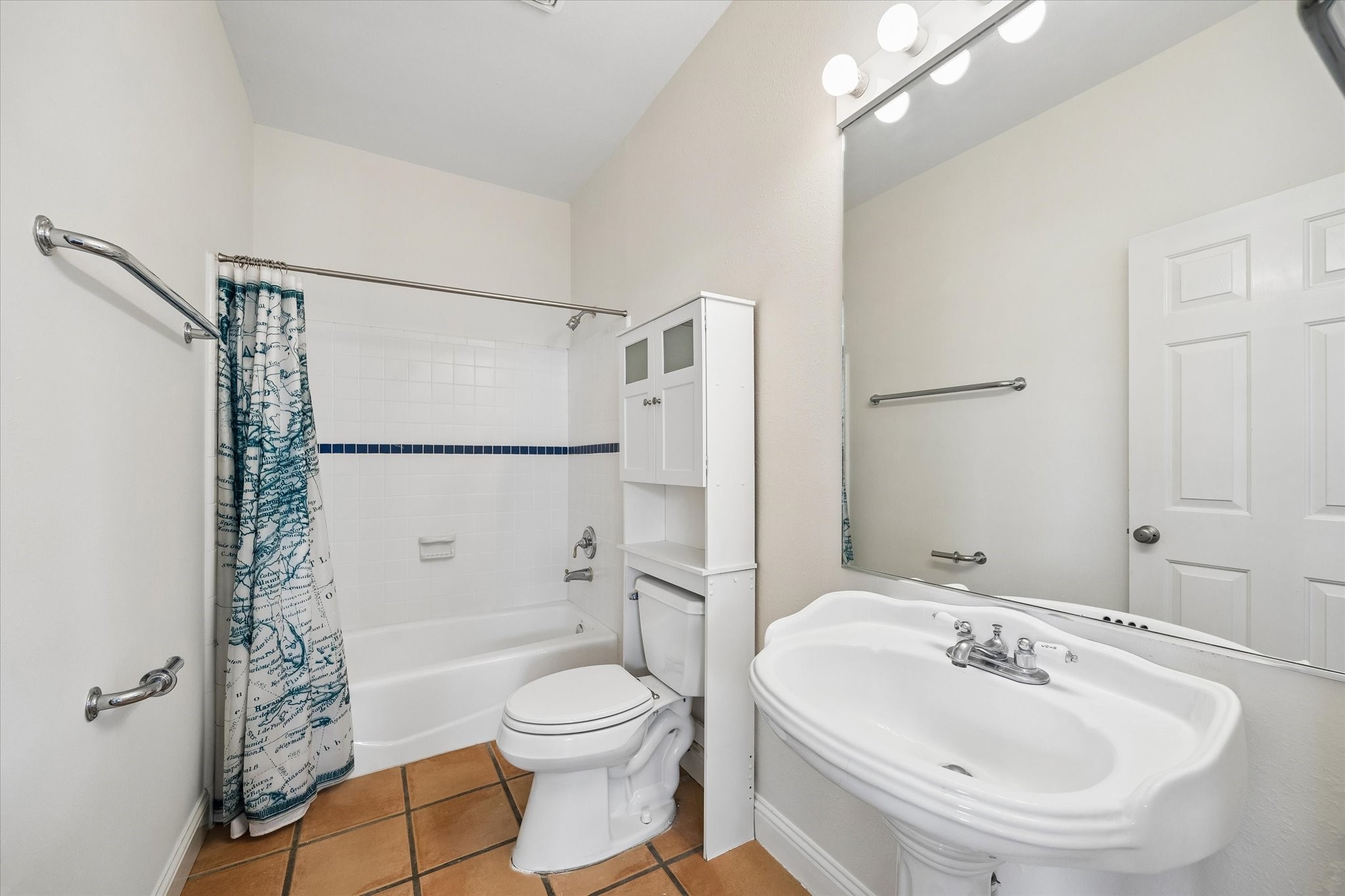 4011 Garrott Street Houston, TX 77006 - Photo 11 of 19 a bathroom with a sink toilet and shower