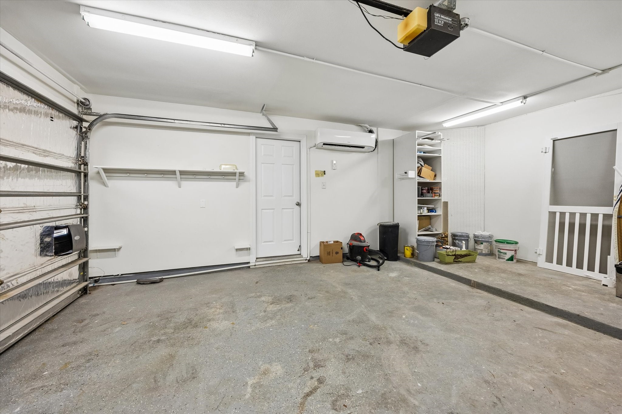 4011 Garrott Street Houston, TX 77006 - Photo 17 of 19 an empty room with windows