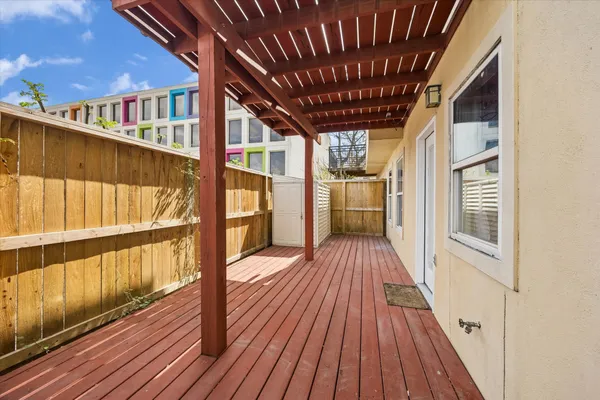 a view of porch with wooden floor