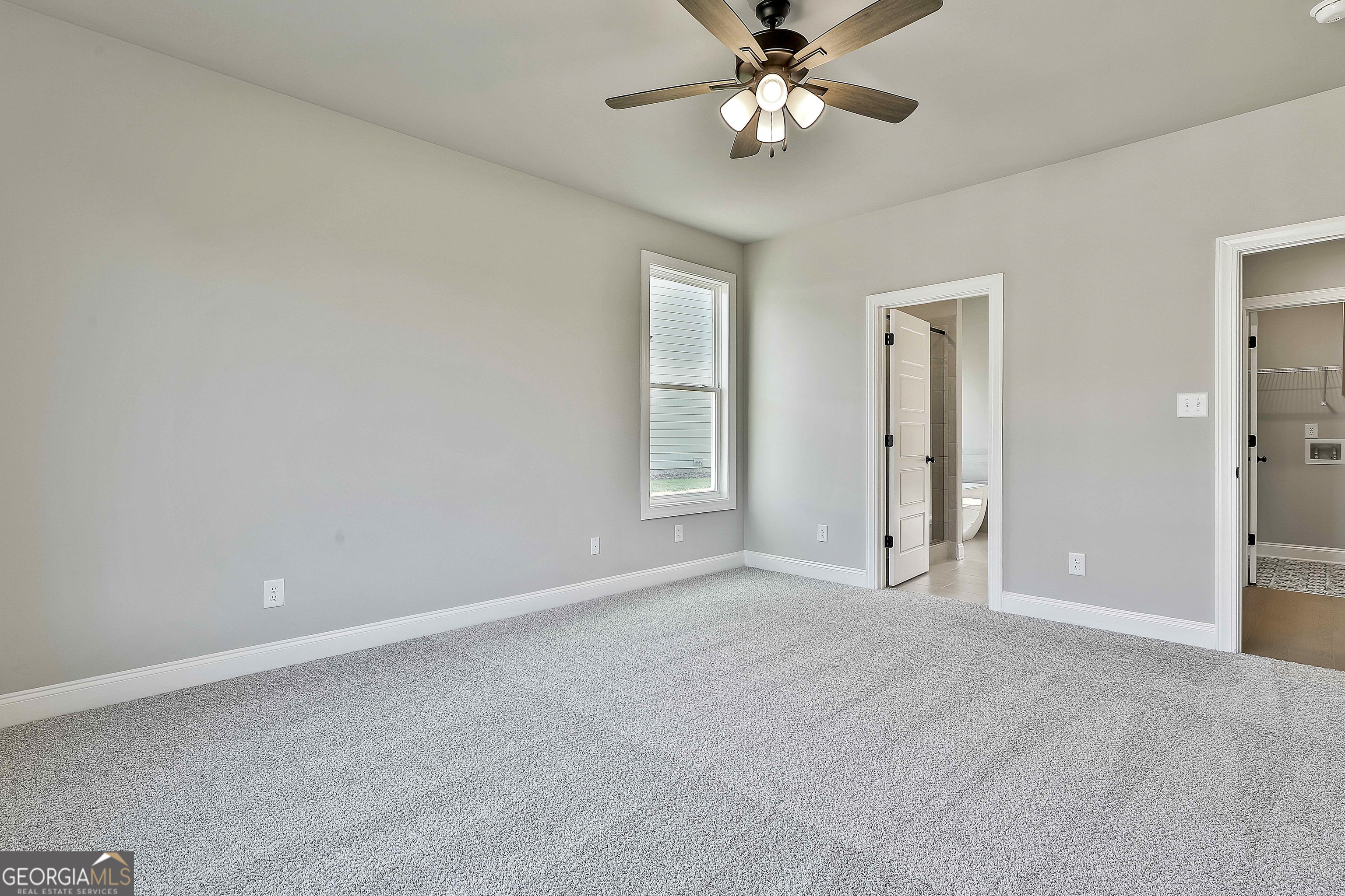 6 Leverett Drive, Unit 17 Newnan, GA 30265 - Photo 20 of 35 a view of an empty room with a window