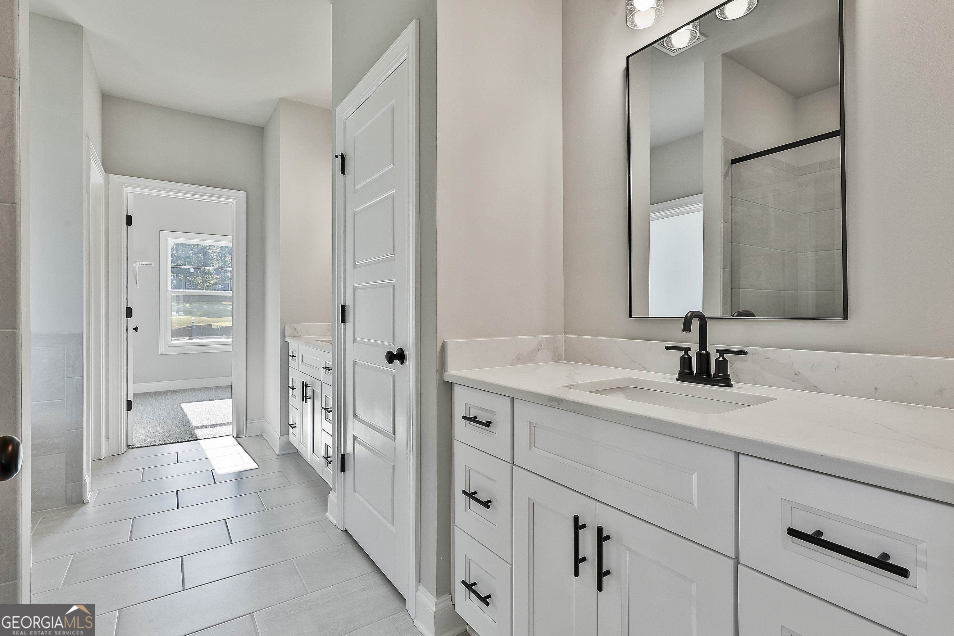 6 Leverett Drive, Unit 17 Newnan, GA 30265 - Photo 21 of 35 a spacious bathroom with a double vanity sink mirror and double