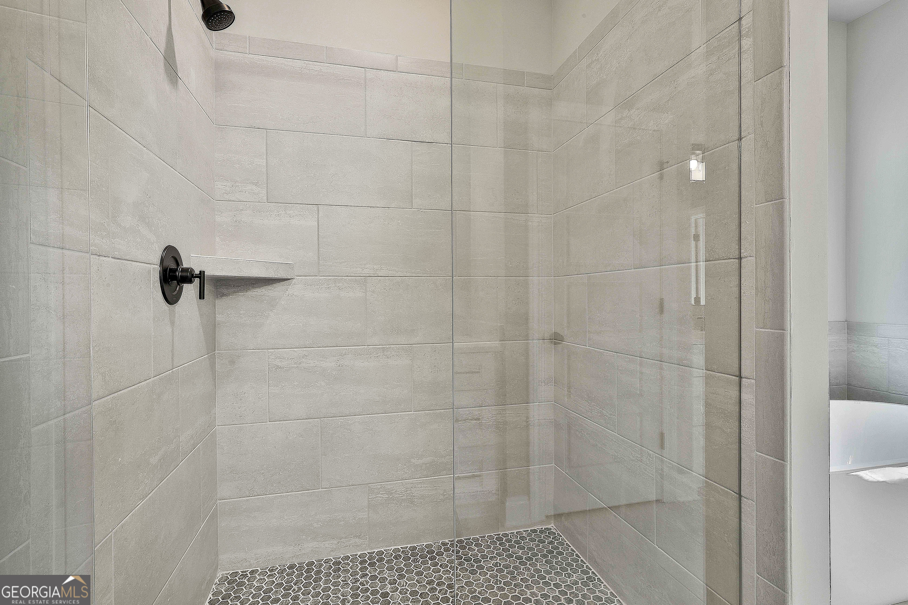 6 Leverett Drive, Unit 17 Newnan, GA 30265 - Photo 22 of 35 a bathroom with a shower