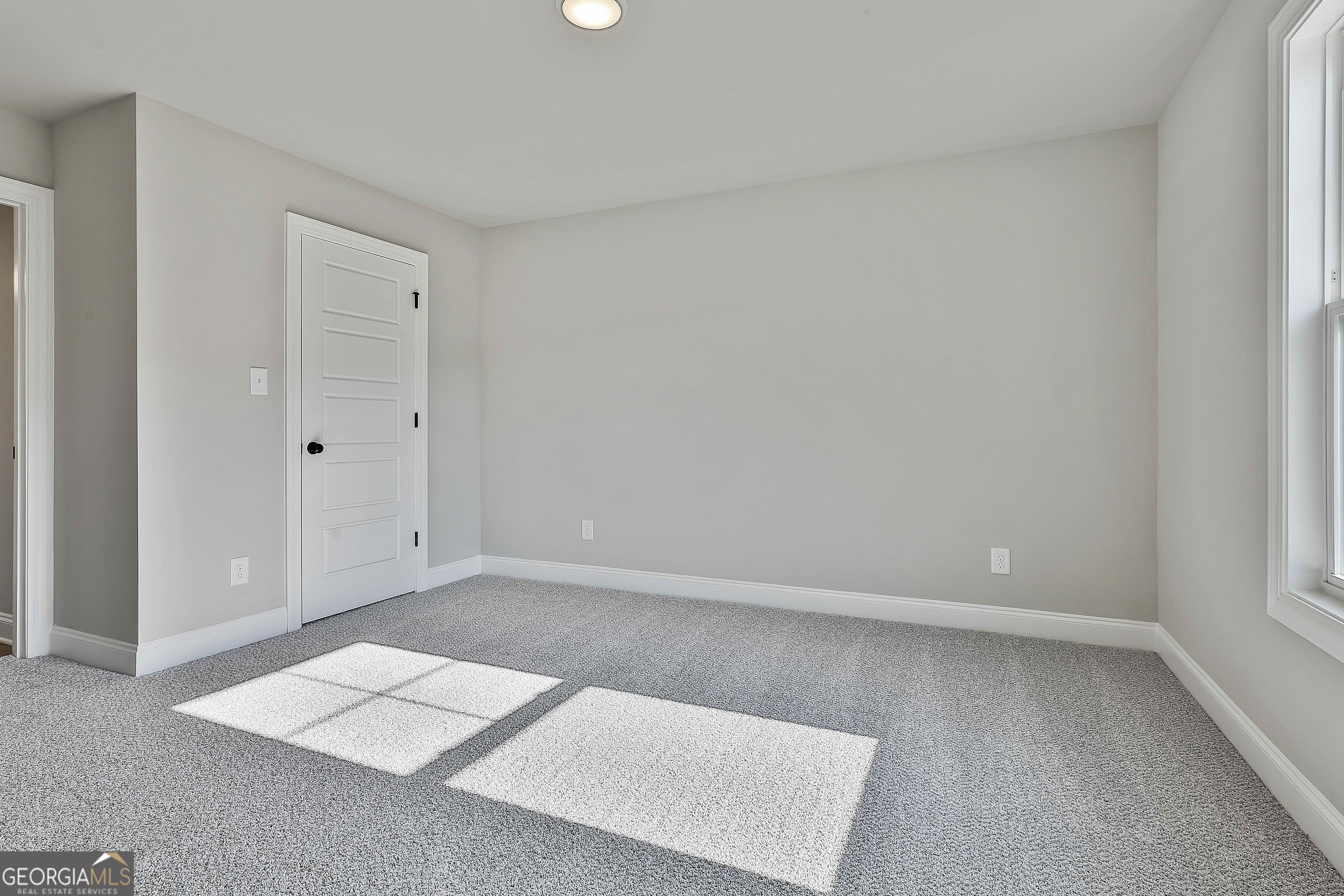 6 Leverett Drive, Unit 17 Newnan, GA 30265 - Photo 31 of 35 an empty room with windows