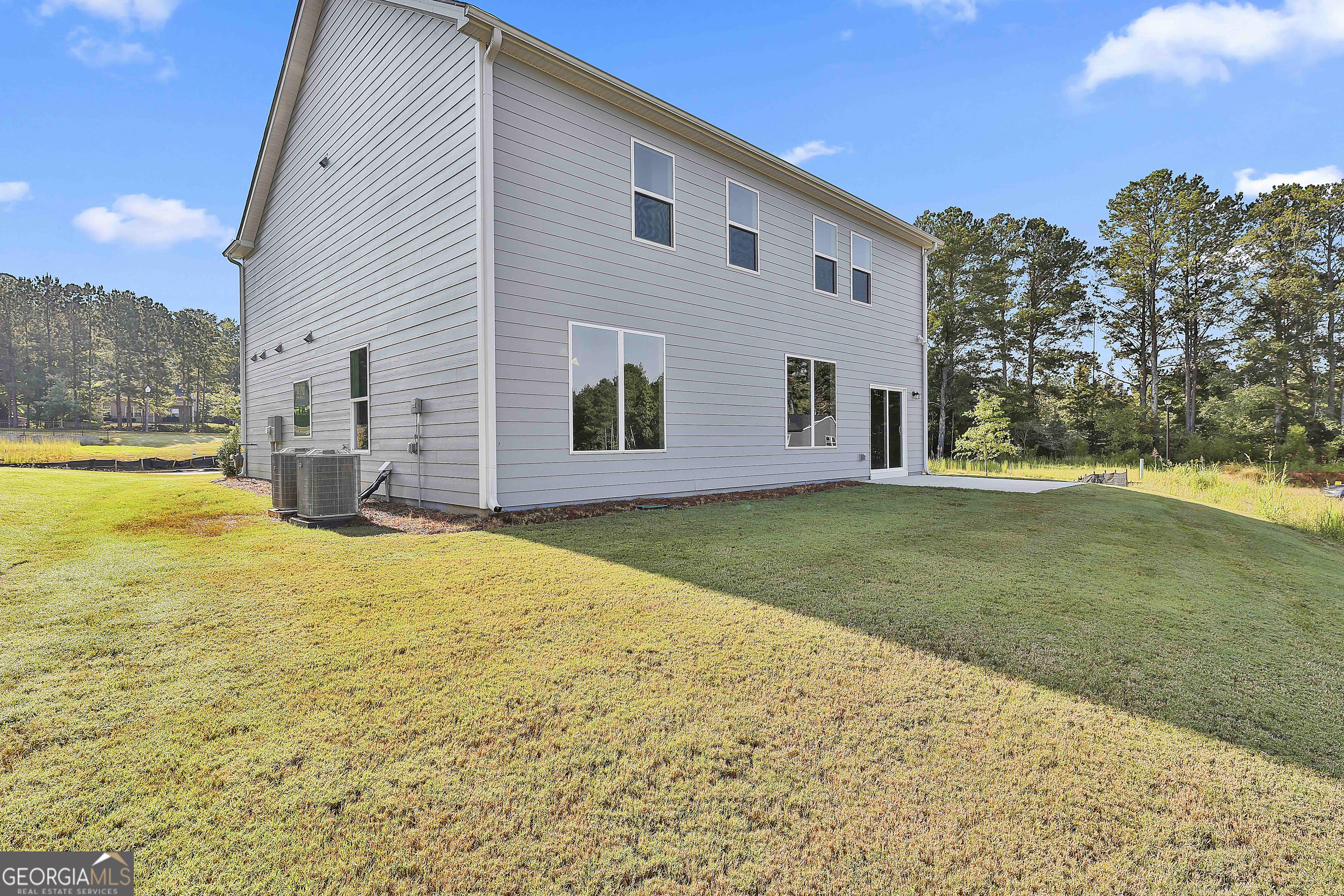 6 Leverett Drive, Unit 17 Newnan, GA 30265 - Photo 35 of 35 a view of a house with a yard