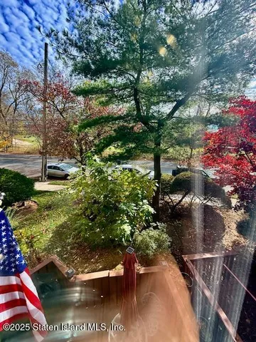 a view of a garden with a fountain