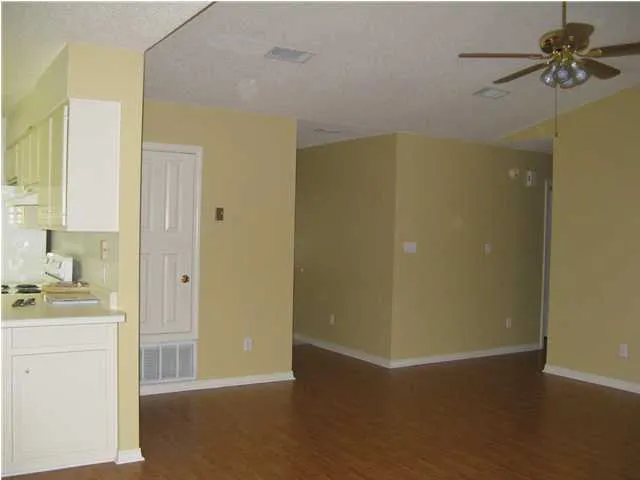a view of a storage & utility room with a sink