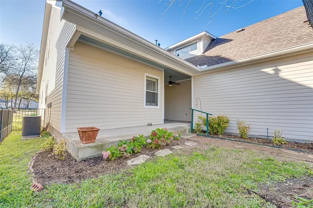 a backyard of a house with lots of green space