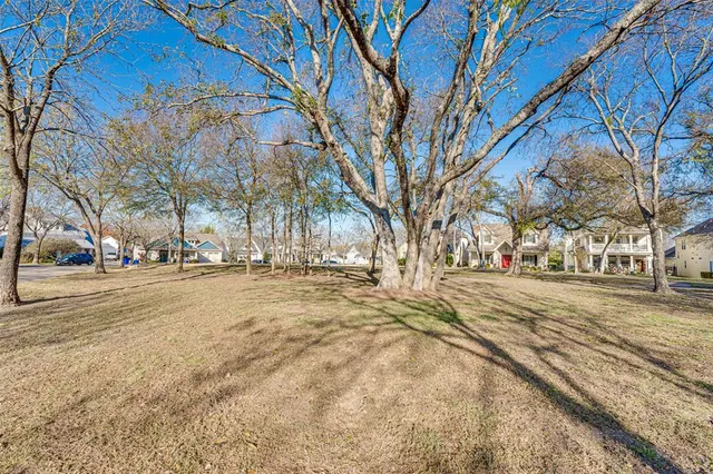an aerial view of residential house with outdoor space and swimming pool