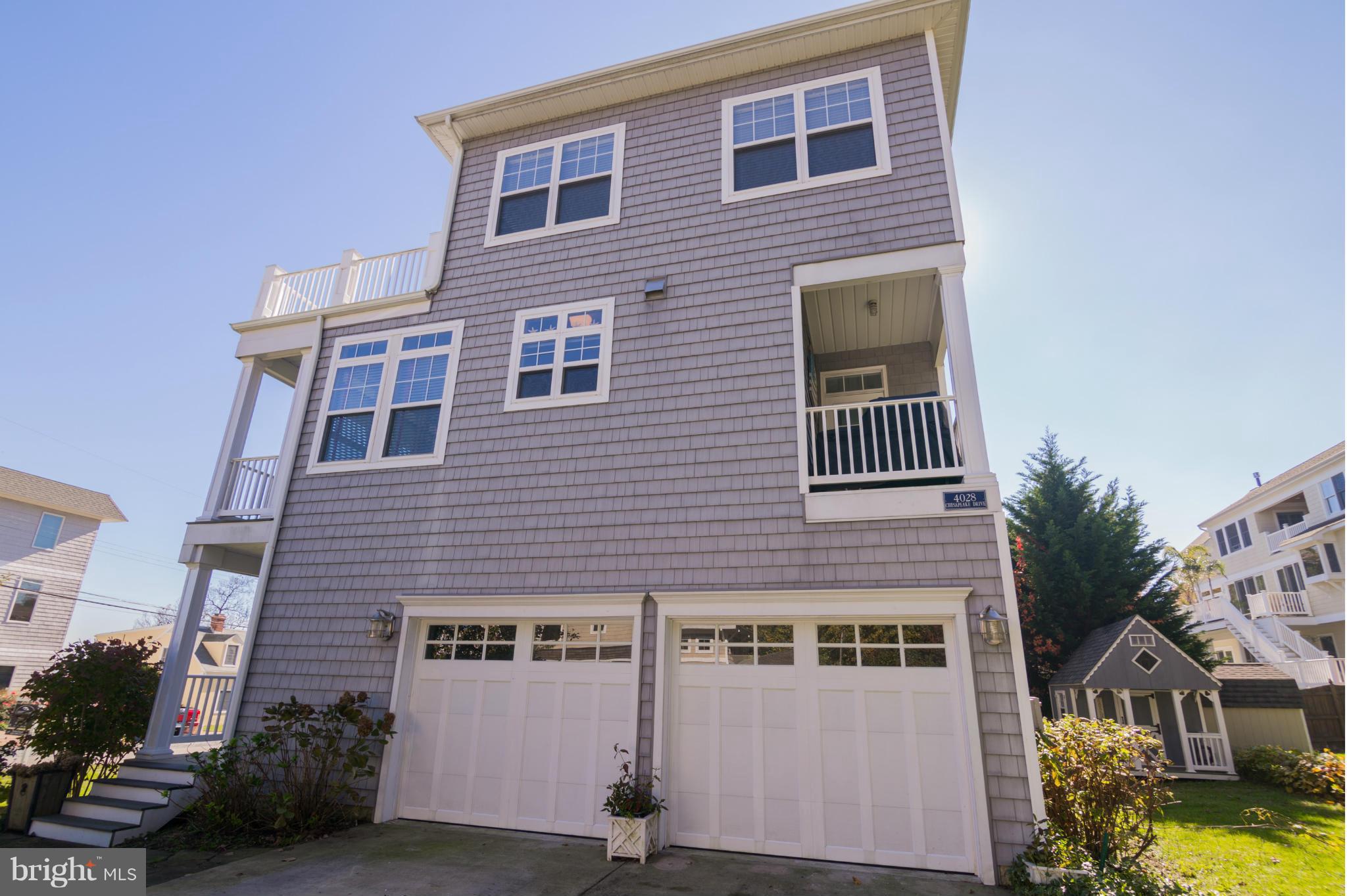 4028 Chesapeake Drive Edgewater, MD 21037 - Photo 30 of 30 a front view of a house with a yard