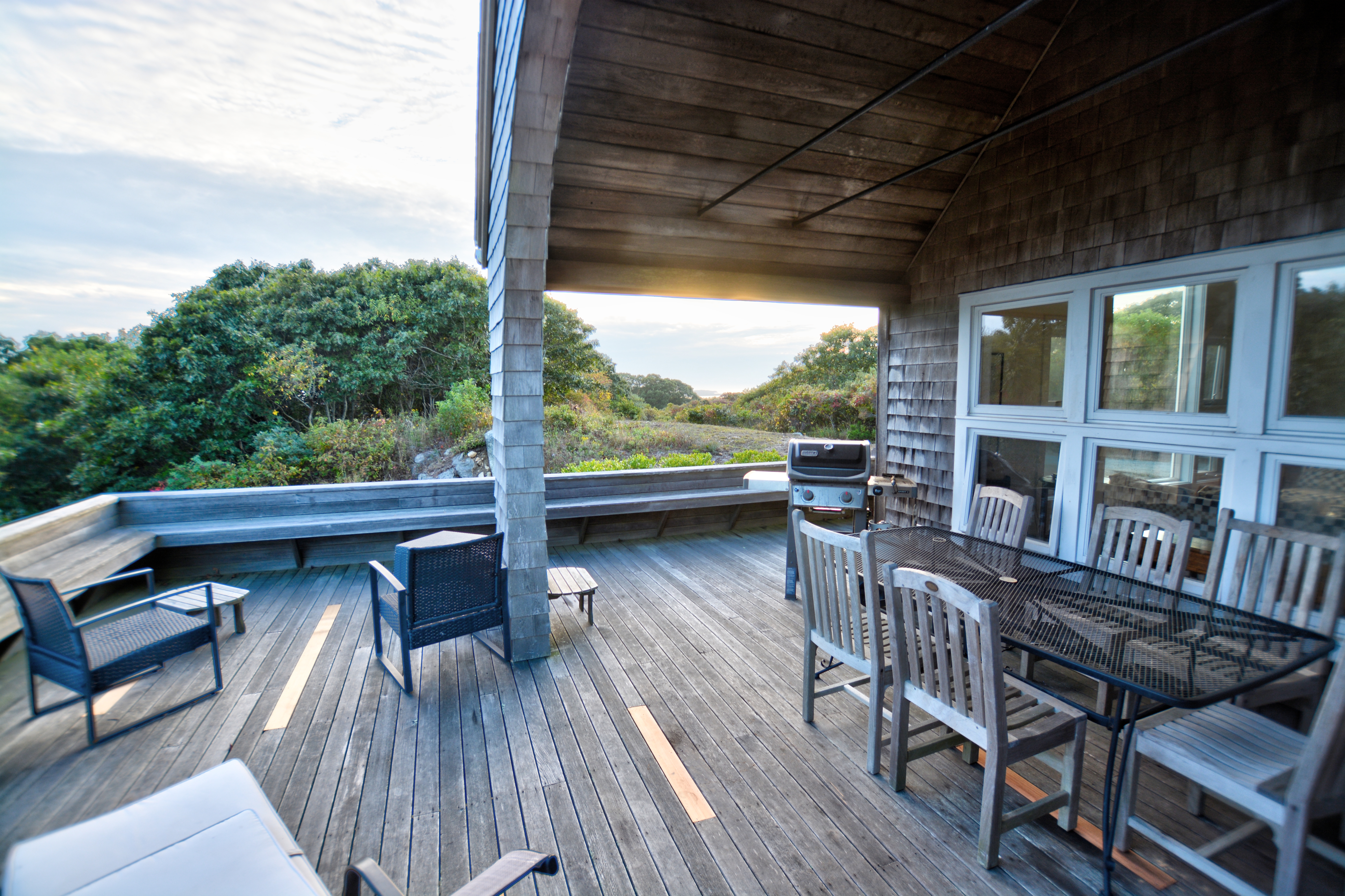 13 Kapigan Road Chilmark, MA 02535 - Photo 13 of 25 a view of a chairs and table on the roof deck
