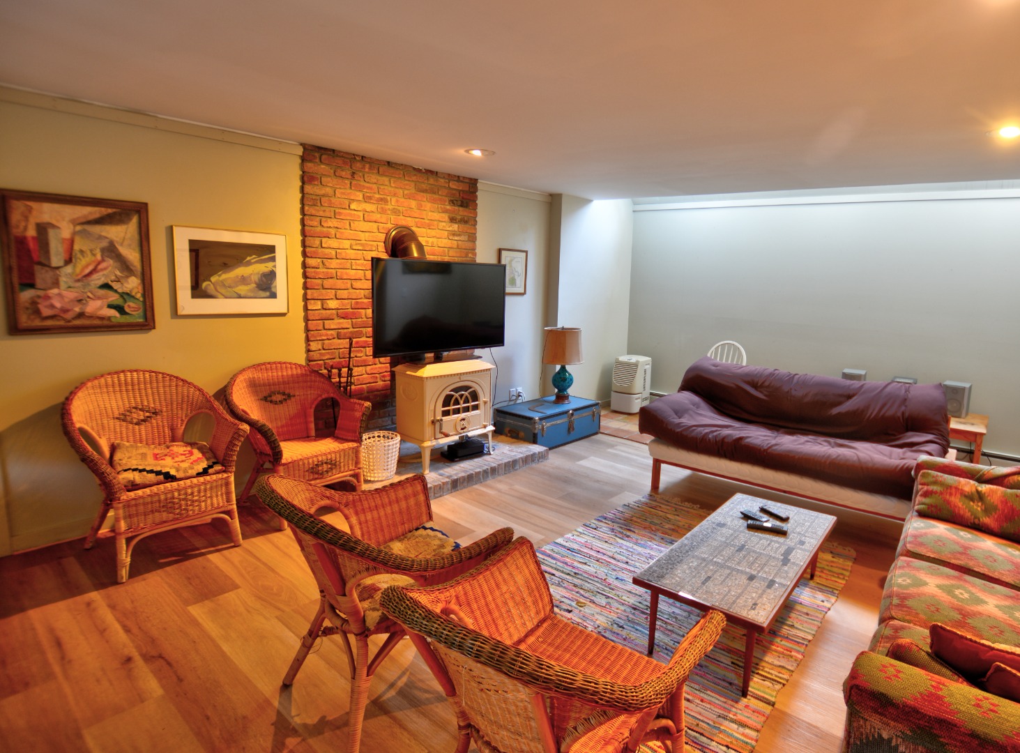 13 Kapigan Road Chilmark, MA 02535 - Photo 15 of 25 a living room with furniture and a flat screen tv